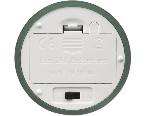 Unterseite eines Elektrogeräts mit Batteriefach für zwei AA Batterien, einem Schalter für Ein, Aus und Timer sowie dem CE Kennzeichen.