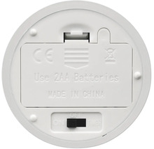 Unterseite eines Geräts mit Batteriefach für zwei AA-Batterien und Schalter für Ein, Aus und Timer-Funktion.