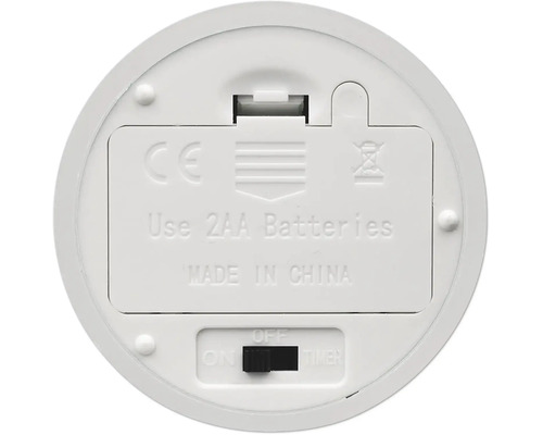 Unterseite eines Geräts mit Batteriefach für zwei AA-Batterien und Schalter für Ein, Aus und Timer-Funktion.