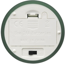 Unterseite eines Geräts mit Batteriefach für zwei AA-Batterien und Schalter mit Ein-, Aus- und Timer-Funktion sowie CE-Kennzeichnung.