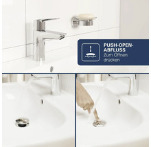 Waschbecken mit verchromter Armatur und Push-Open-Ablaufventil, das durch einfaches Drücken bedient wird.