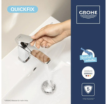 GROHE Logo. Badarmatur mit Hand am Hebel und fließendem Wasser. Inklusive QuickFix, QuickTool, Design aus Deutschland und 5 Jahre Garantie.