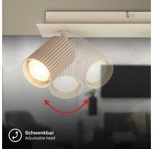 Schwenkbare Deckenleuchte mit Spot im geriffelten Design.