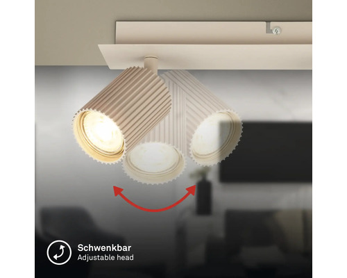 Schwenkbare Deckenleuchte mit Spot im geriffelten Design.