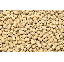 Nahaufnahme von zylindrischen Holzpellets.