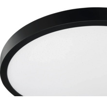 Runde LED-Deckenleuchte mit schwarzem Rand und weißem Diffusor mit Sterneneffekt.