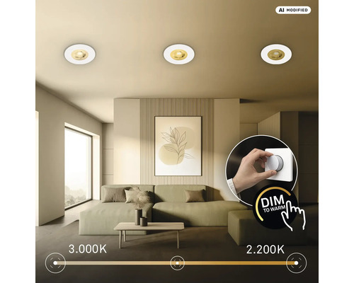 Wohnzimmer mit drei Deckenstrahlern und Dimmer Funktion die Farbtemperatur von 3000 Kelvin auf 2200 Kelvin anpasst.