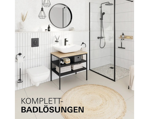 Modernes Badezimmer mit weißem Hänge-WC, schwarzem Waschtisch mit Aufsatzbecken und einer Walk-In-Dusche mit schwarzem Rahmen und Armaturen.