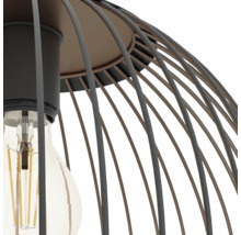 Detailansicht einer Pendelleuchte mit schwarzem Drahtkäfig und LED-Filament-Leuchtmittel.