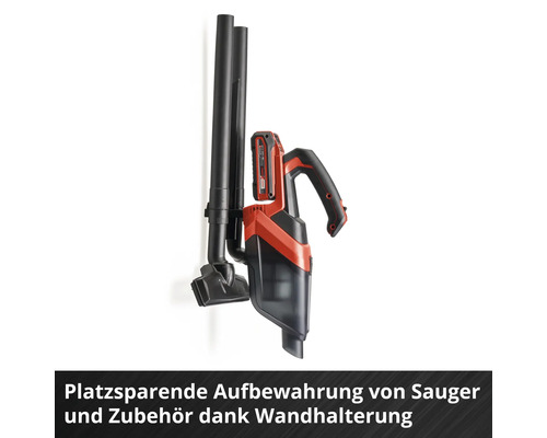 Akku-Handstaubsauger mit Zubehör in platzsparender Wandhalterung.