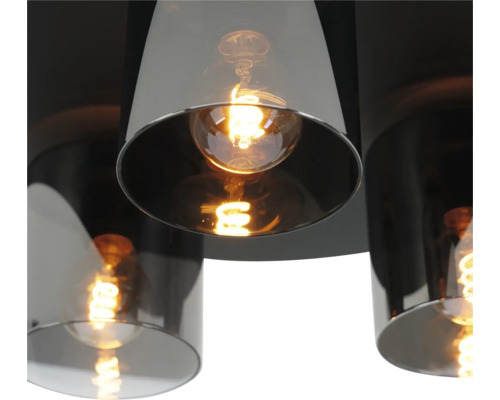 Moderne Deckenleuchte mit zylindrischen Schirmen aus Rauchglas und leuchtenden Filament-Leuchtmitteln.