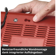 Rückansicht eines roten Elektrogeräts mit integrierter Aufhängeöse für eine einfache Wandmontage.