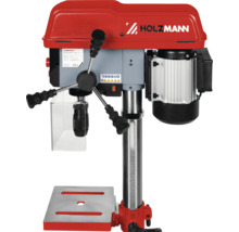 Holzmann Tischbohrmaschine mit Bohrfutter und Schutzvorrichtung auf einem stabilen Maschinentisch montiert
