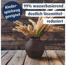 Dekorative Vase mit getrockneten Gräsern auf einer Holzoberfläche. Hinweis auf Kinderspielzeugseignung und lösemittelreduzierte wasserbasierte Farbe.