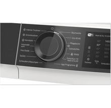Bedienblende eines Waschtrockners mit Drehwahlschalter fuer Programme und digitalem Display mit WLAN Symbol.