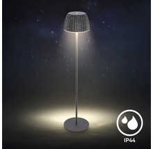 Moderne LED Stehlampe für den Außenbereich mit IP44 Schutz gegen Spritzwasser, mit geripptem Lampenschirm und schmalem Standfuß.