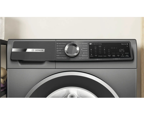 Bedienblende eines Bosch Serie 6 Waschtrockners mit Drehwahlschalter und digitalem Display.