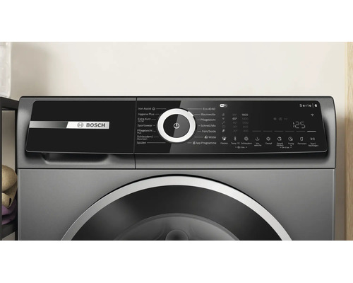 Bedienblende einer Bosch Serie 6 Waschmaschine mit Digitaldisplay und Programmauswahl.