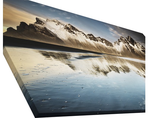 Leinwandbild mit Berglandschaft und Wasserreflektion