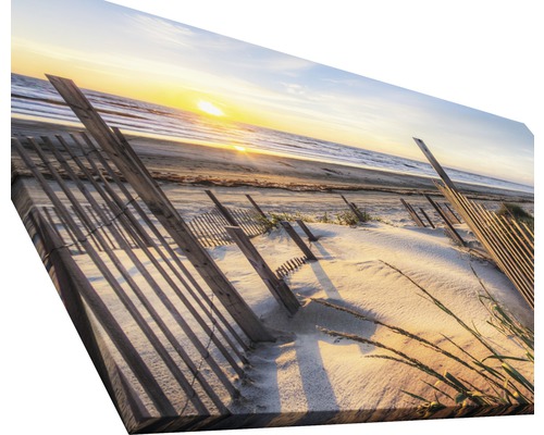Leinwandbild einer Küstenlandschaft mit Zaun im Sand