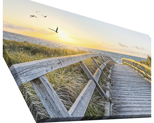 Leinwanddruck mit Motiv eines Holzstegs zum Strand