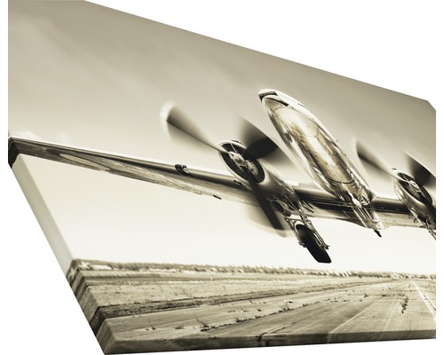 Leinwandbild eines Flugzeugs im Start