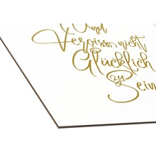 Wandbild mit dem Schriftzug ''Und vergiss nicht, glücklich zu sein''