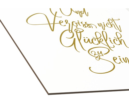 Wandbild mit dem Schriftzug ''Und vergiss nicht, glücklich zu sein''