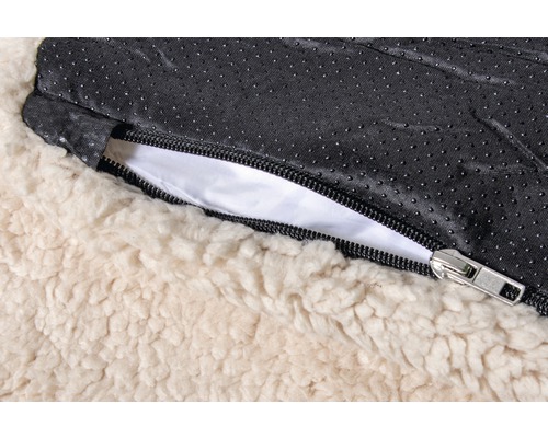 Detailansicht eines Hundebetts mit Reißverschluss und flauschiger Oberfläche