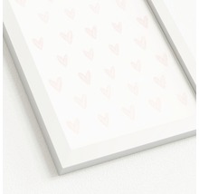 Gerahmtes Bild mit Herzmotiven