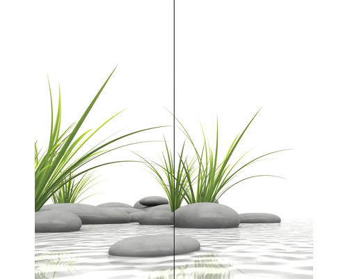 Dekorativer Garten mit Steinen und Ziergras