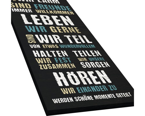 Dekoratives Holzschild mit aufgedruckten Sprüchen