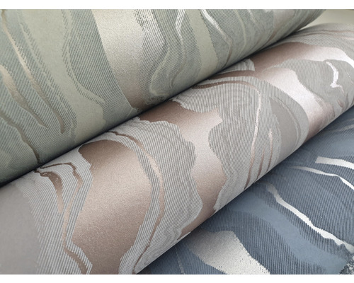 Mehrere Tapetenrollen mit abstraktem Muster