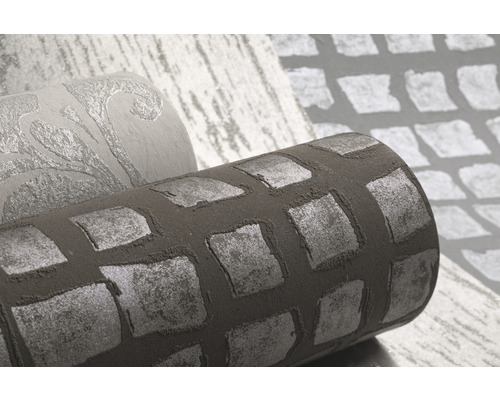 Nahaufnahme von Rollen mit verschiedener Muster-Tapete