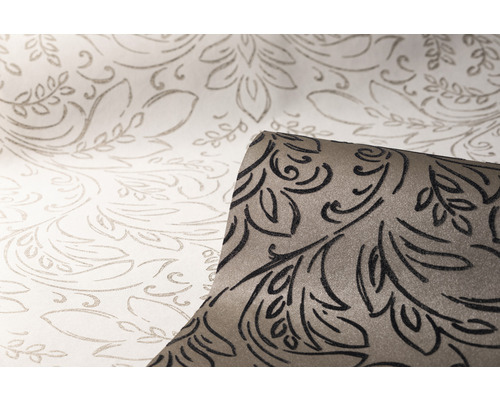 Muster von Vliestapeten mit floralem Design