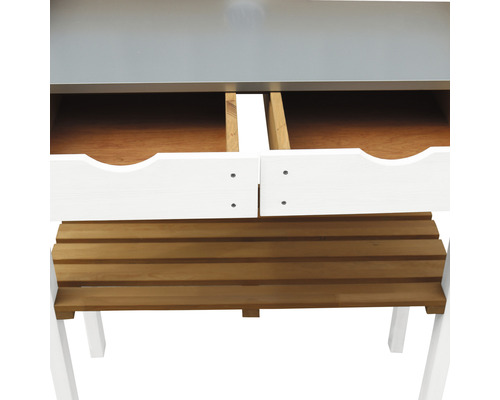 Detailansicht eines Kinderschreibtisches mit Schubladen und Sitzbank