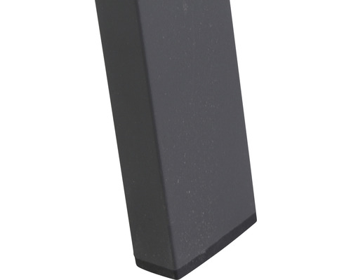 Detailansicht eines Tischbeins aus Metall mit Bodenschoner