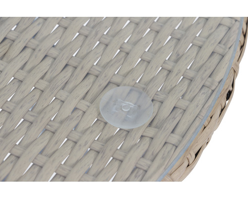 Detailansicht einer Gartentischplatte aus Rattan mit Saugnapf zur Befestigung einer Glasplatte