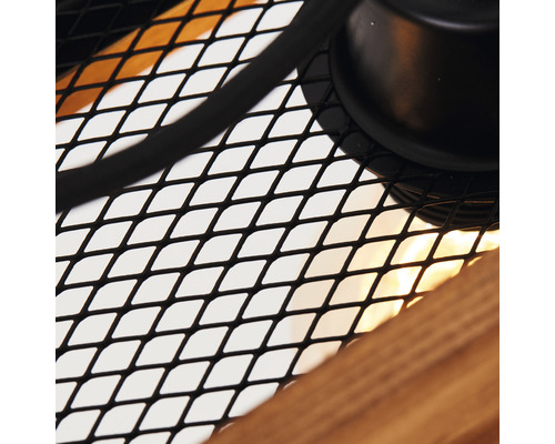 Detailaufnahme einer Lampe mit Metallgitter und Holzelement