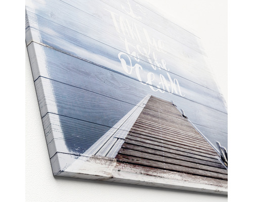 Leinwandbild mit Steg zum Ozean Motiv