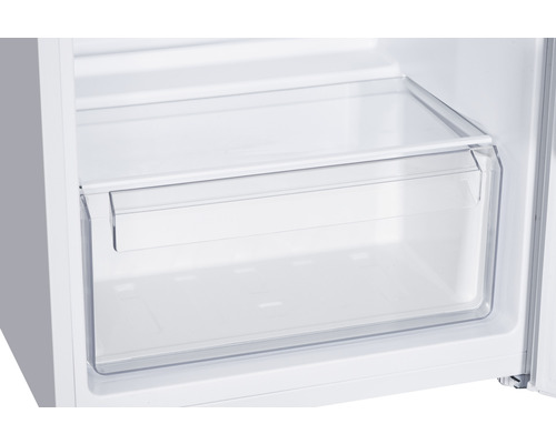 Innenansicht eines Kühlschranks mit einer transparenten Schublade