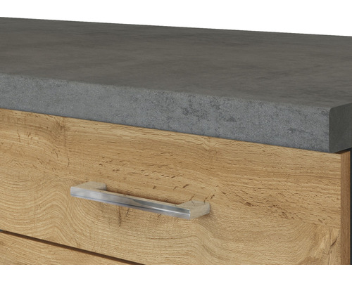 Detailaufnahme eines Schubladenelements mit Arbeitsplatte in Betonoptik