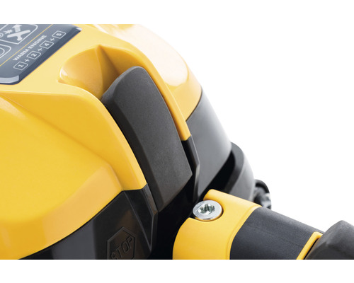 Detailansicht eines gelben Geräts mit einem Schalter