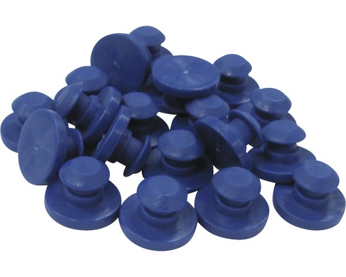 Eine Ansammlung von blauen Verschlussstopfen aus Kunststoff.