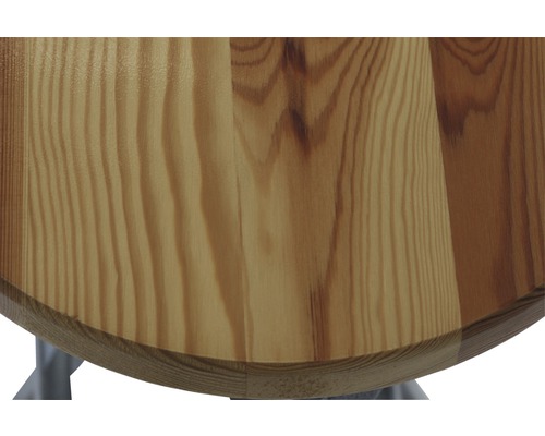 Detailansicht einer runden Tischplatte aus Holz