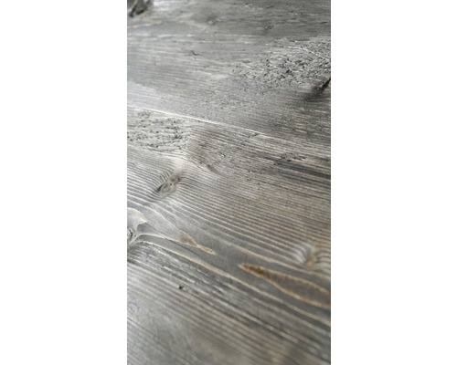 Nahaufnahme einer grauen Holzoberfläche mit Maserung