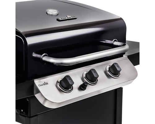 Detailansicht eines schwarzen Gasgrills mit drei Bedienknöpfen und Griff