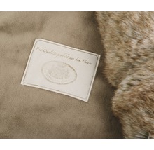 Cozze Qualitätssiegel auf Textil