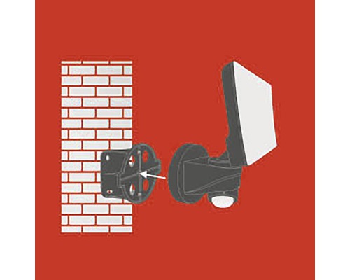 Installation einer LED-Außenleuchte an einer Backsteinmauer.