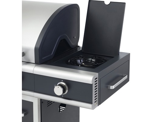 Detailansicht eines Gasgrills mit Seitenkochfeld und Bedienknöpfen